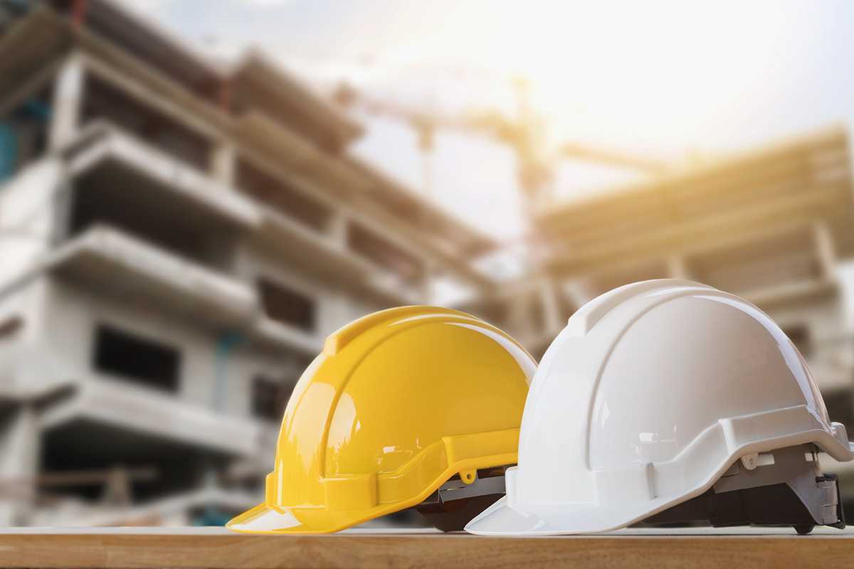 yellow-and-white-helmet-safety-in-construction-site